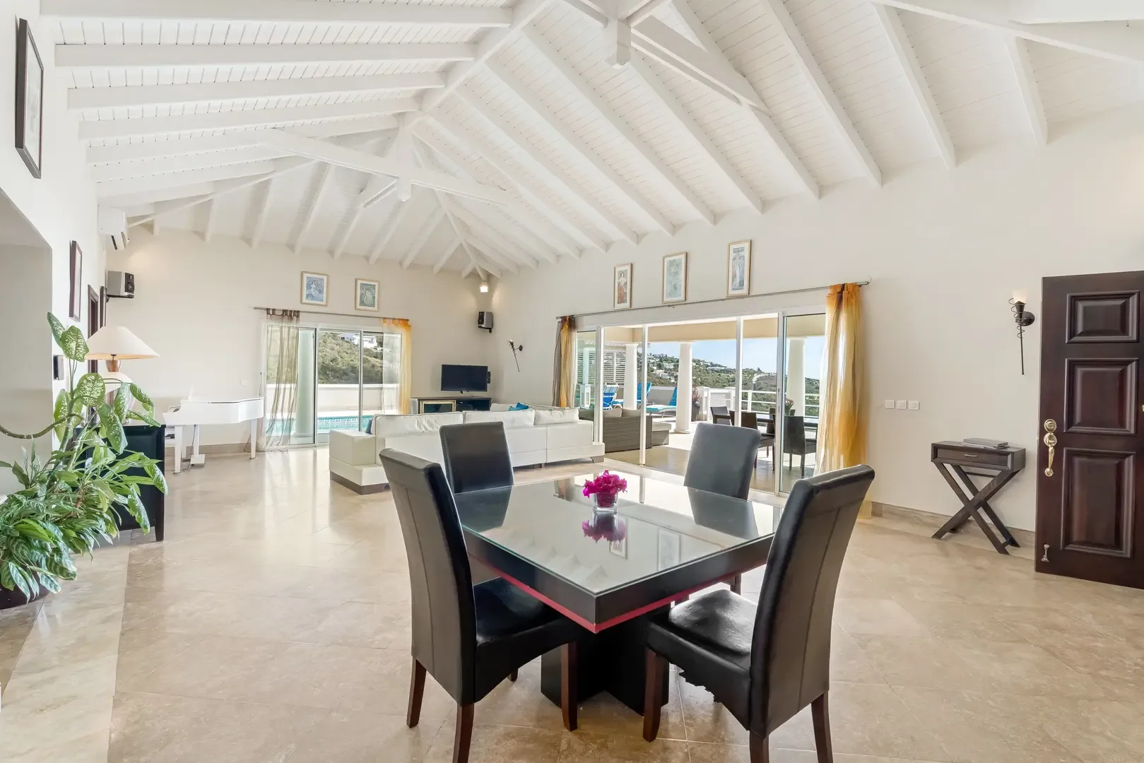 A grand piano in the living room — sophisticated evenings start here.