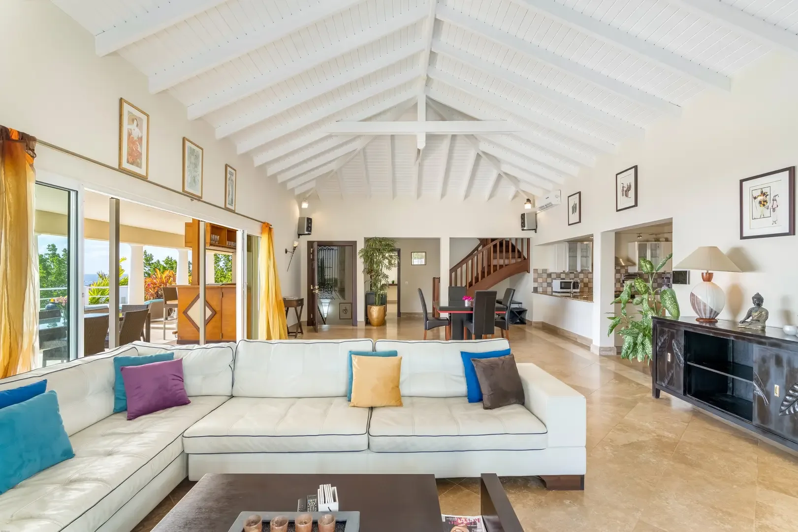 Bright open-plan living — the dining area connects to your covered terrace.