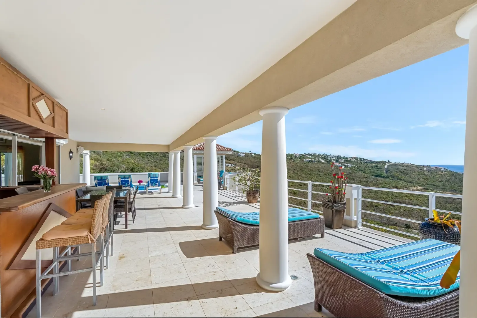 Pull up a stool at your private bar — ocean views and sunset cocktails await.