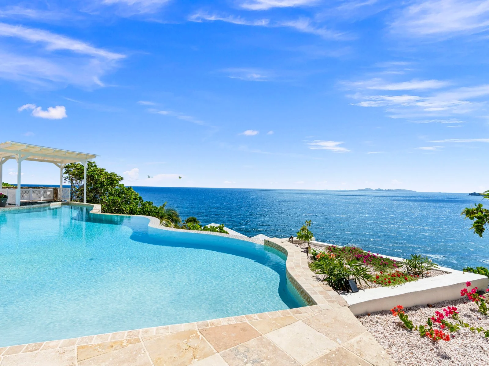 Infinity pool with panoramic ocean views