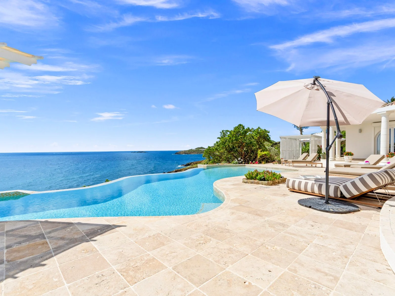 Infinity pool with panoramic ocean views