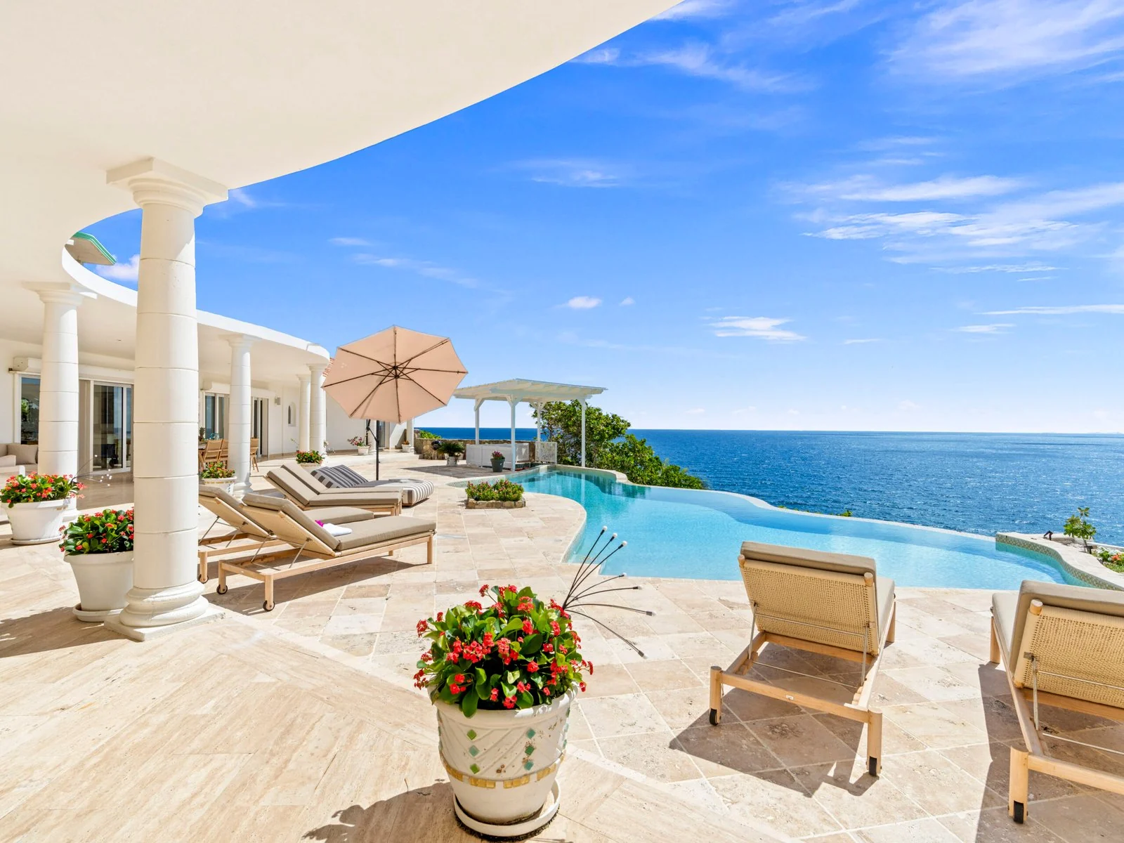 Infinity pool with panoramic ocean views