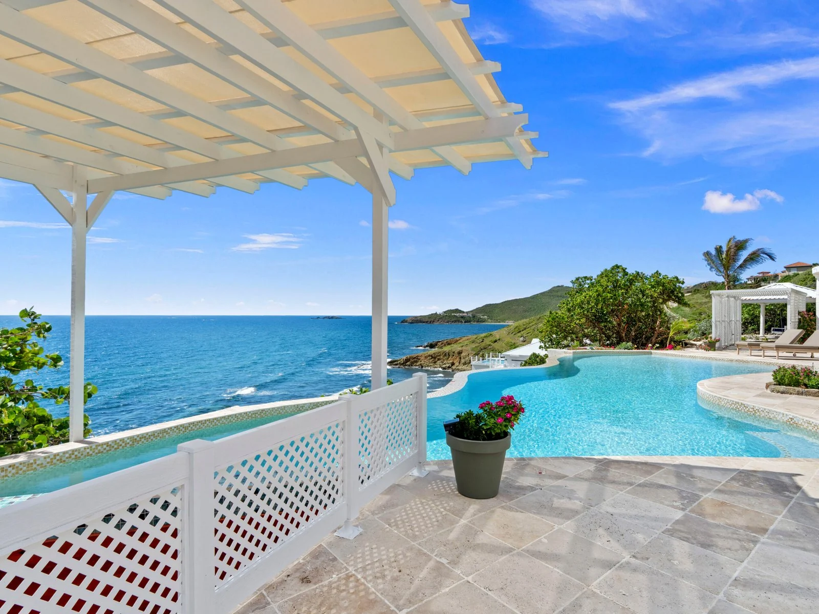 Infinity pool with panoramic ocean views