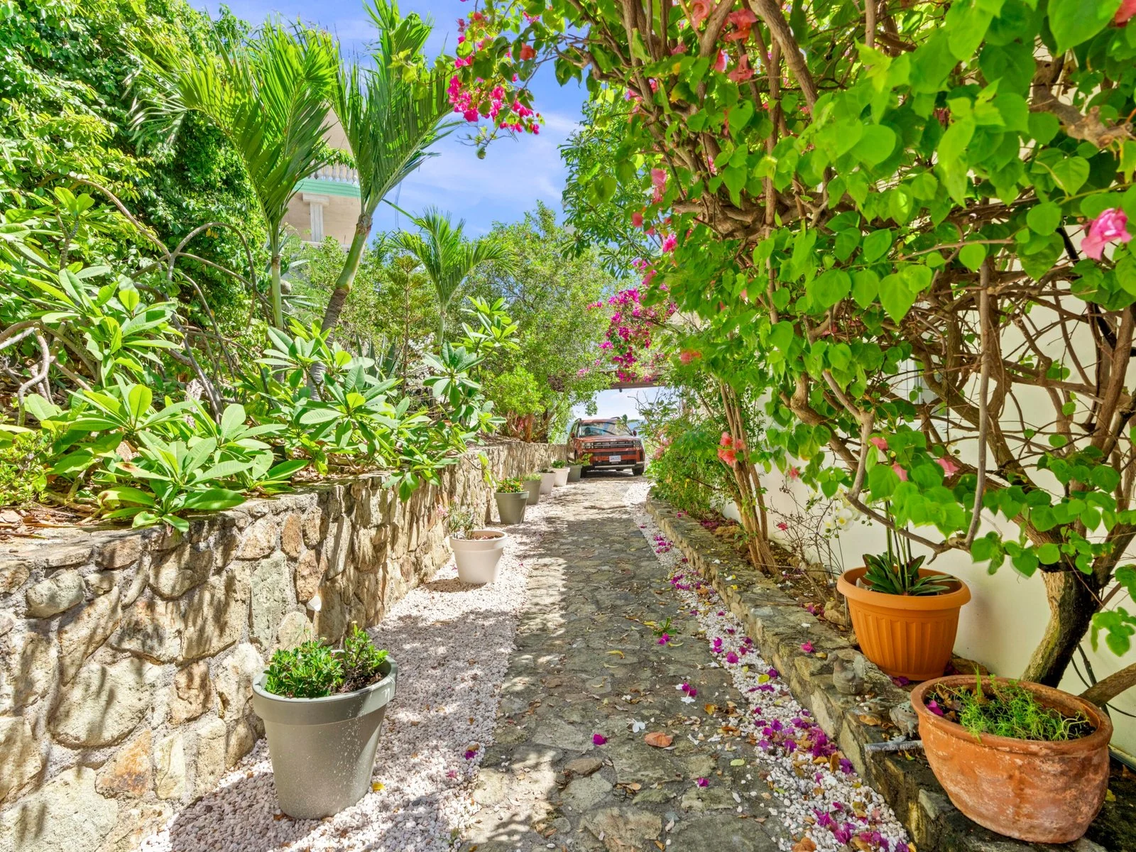 Landscaped garden path and private parking