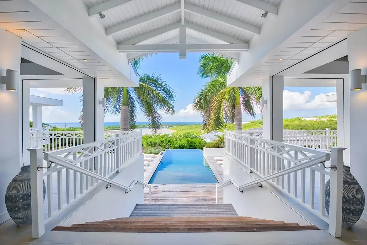 Cool comfort meets tropical style in this air-conditioned bedroom.