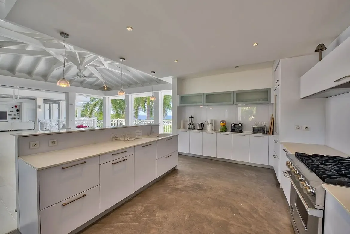 A chef's dream kitchen with stainless appliances and abundant storage.