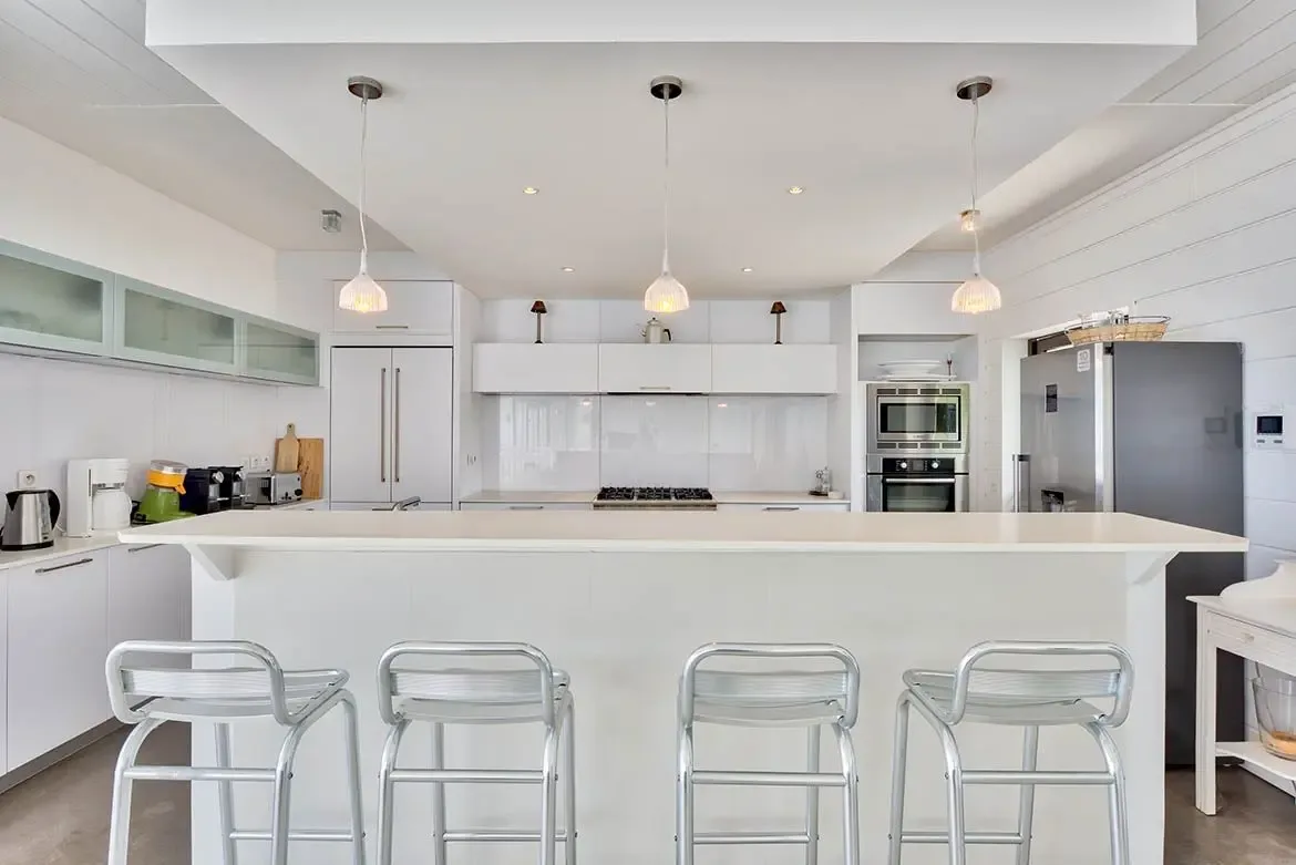 Airy living space with soaring ceilings and natural light.