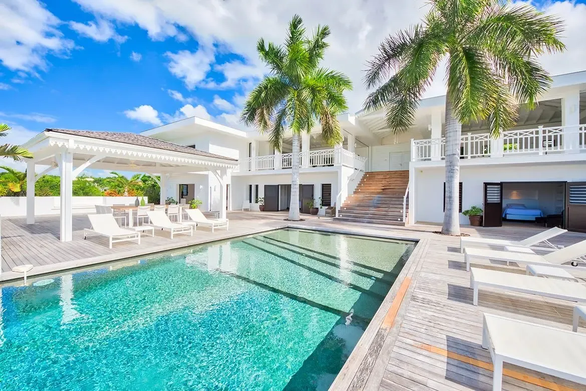 The complete picture: pool, pavilion, loungers, and ocean — everything you need.