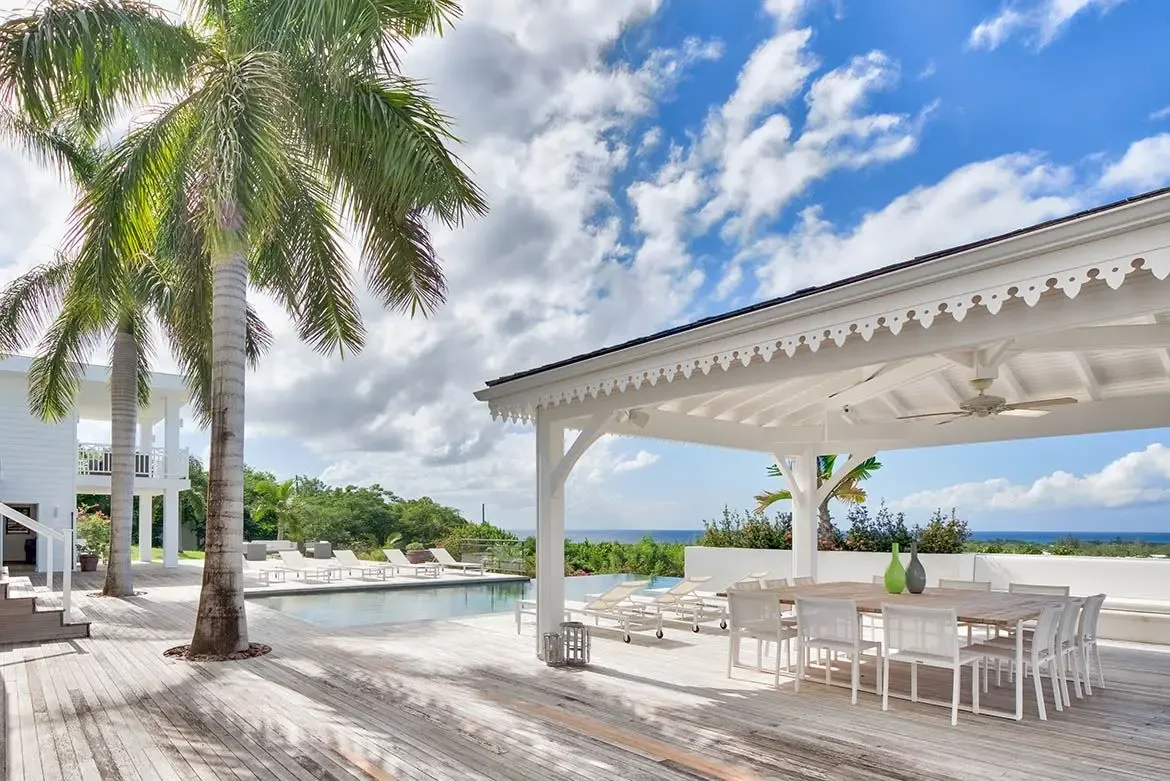 Your private oasis: infinity pool, covered pavilion, and endless ocean views.
