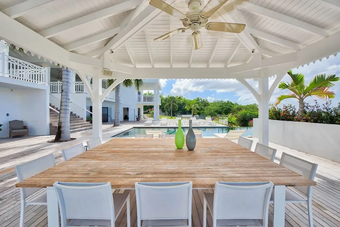 Sun-drenched deck with comfortable loungers for perfect relaxation.