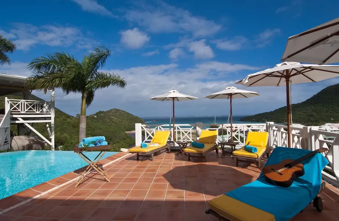Terrace with sweeping mountain and harbor views.