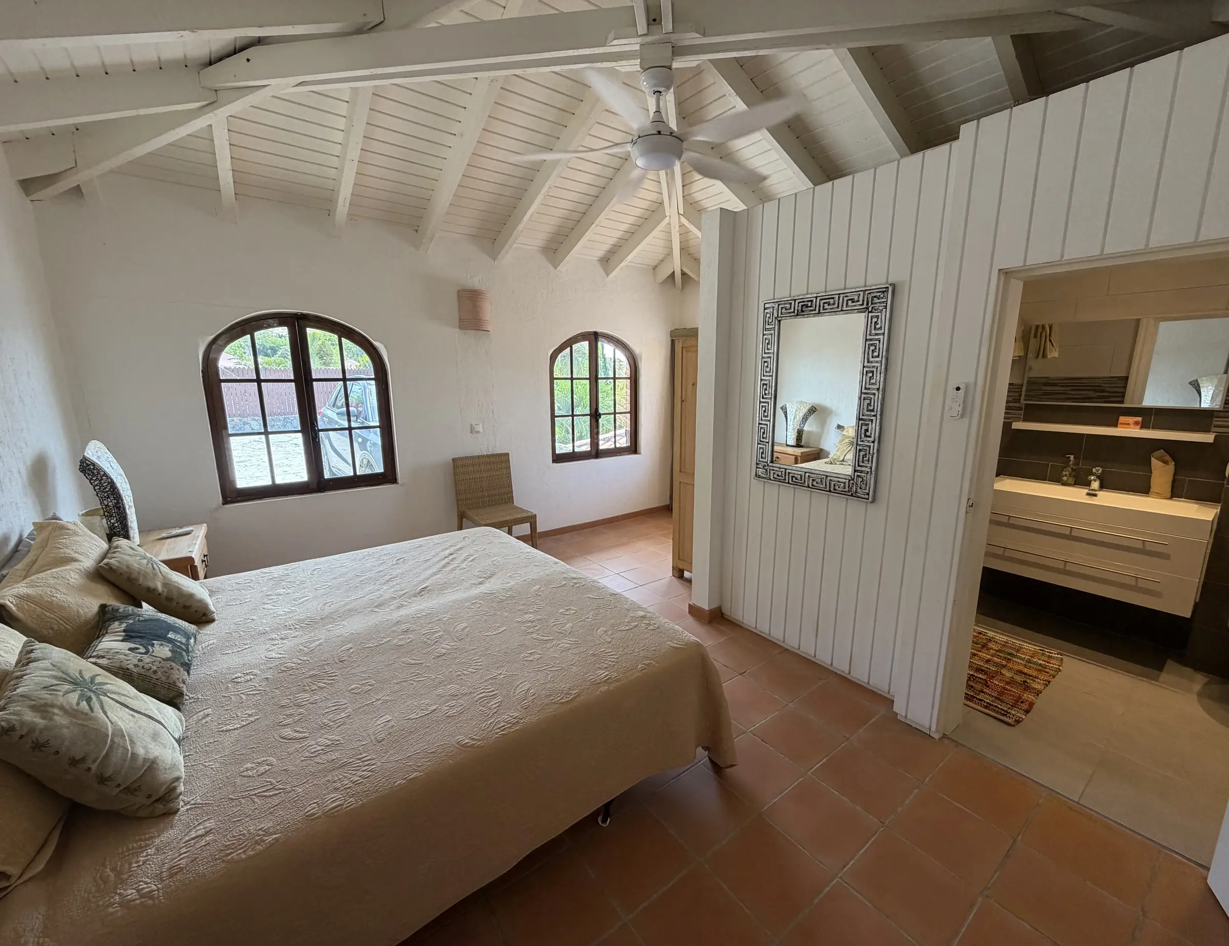 Bedroom 4 features a vaulted ceiling, arched windows, and an en-suite bathroom.
