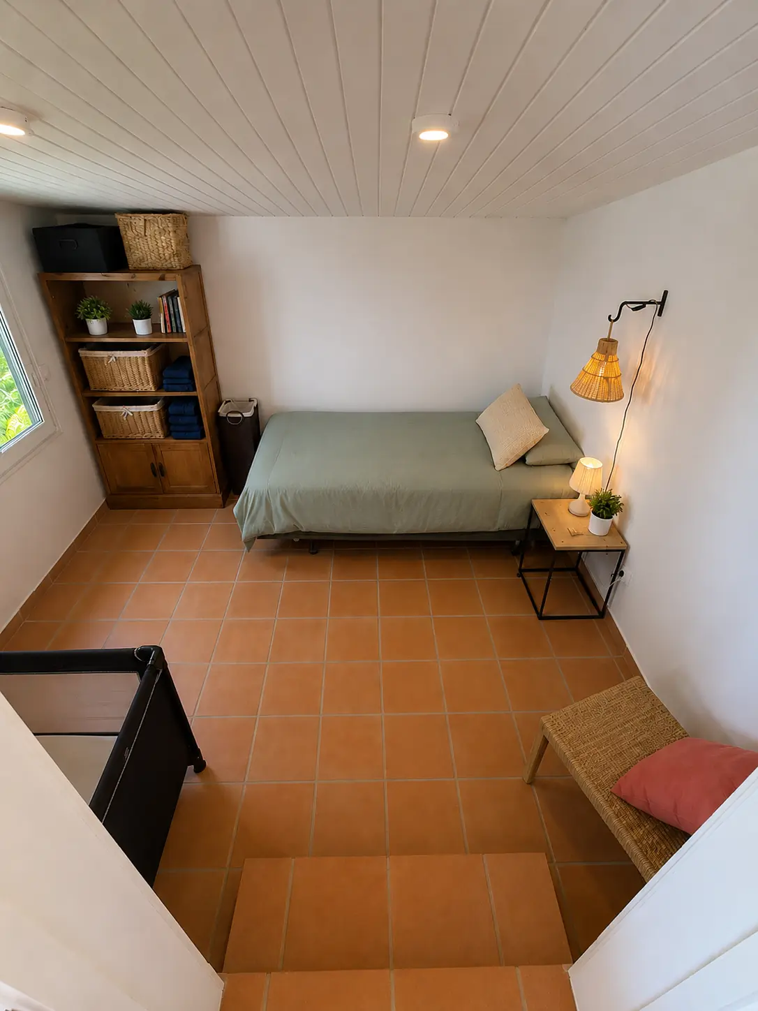 The adjoining extra room beside Bedroom 1 offers flexible space for young children.