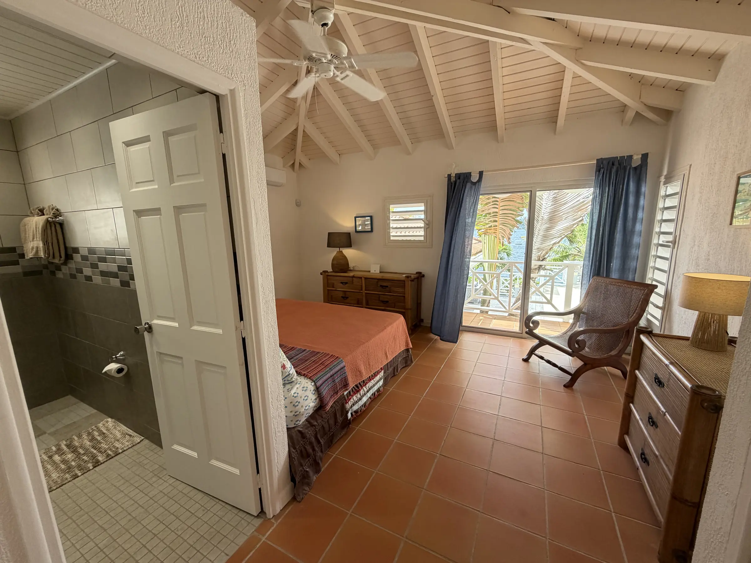Bedroom 3 includes private en-suite access and opens toward the terrace.