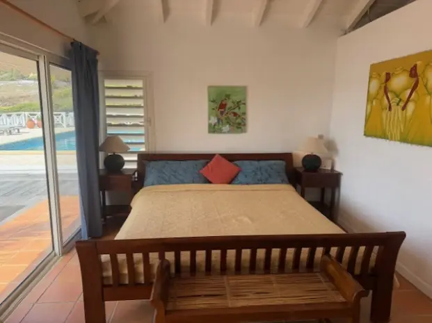 Bedroom 2 provides a calm retreat with direct terrace access.