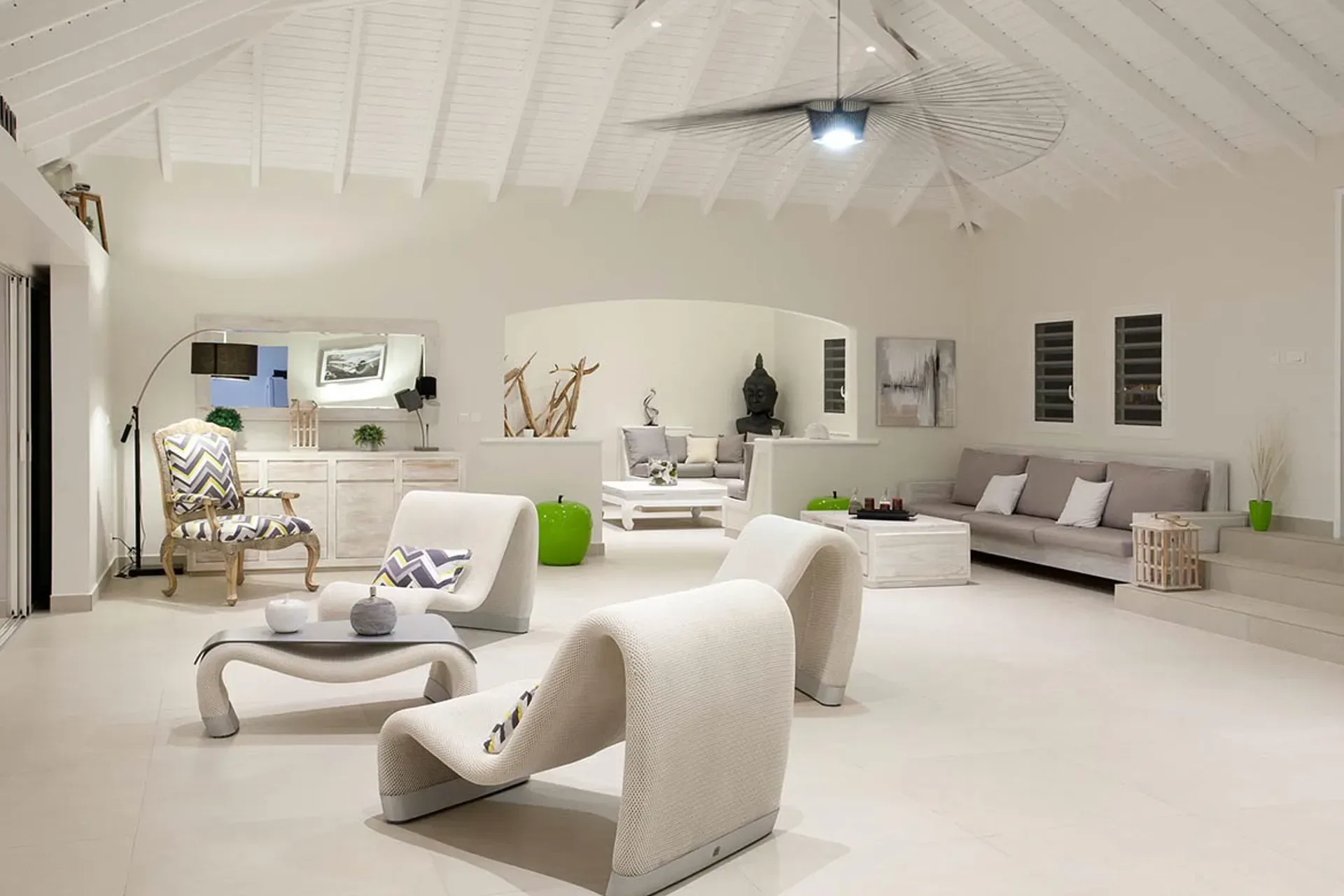 Terrace deck with loungers and pool views.
