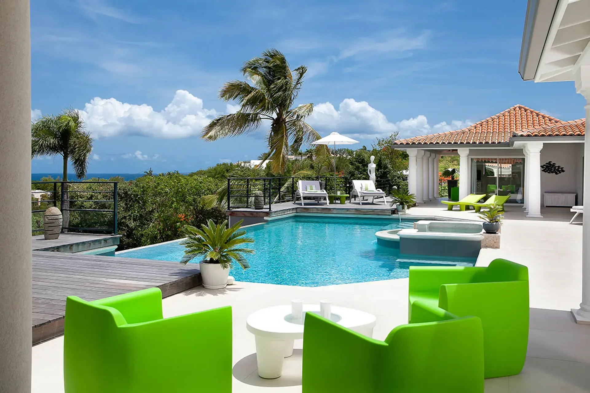 Terrace deck with tropical garden views.