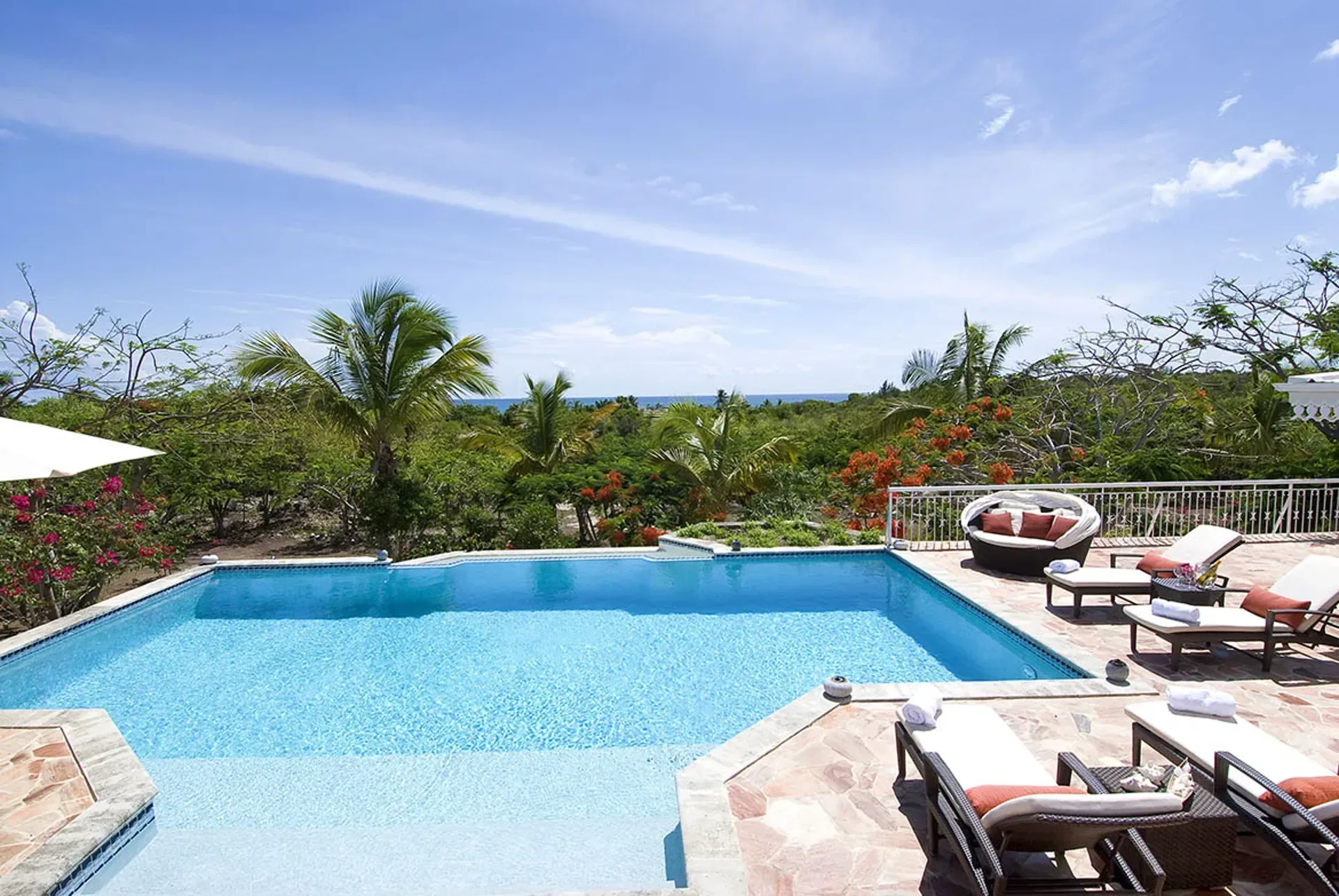 Bedroom with beautiful views of tropical gardens.