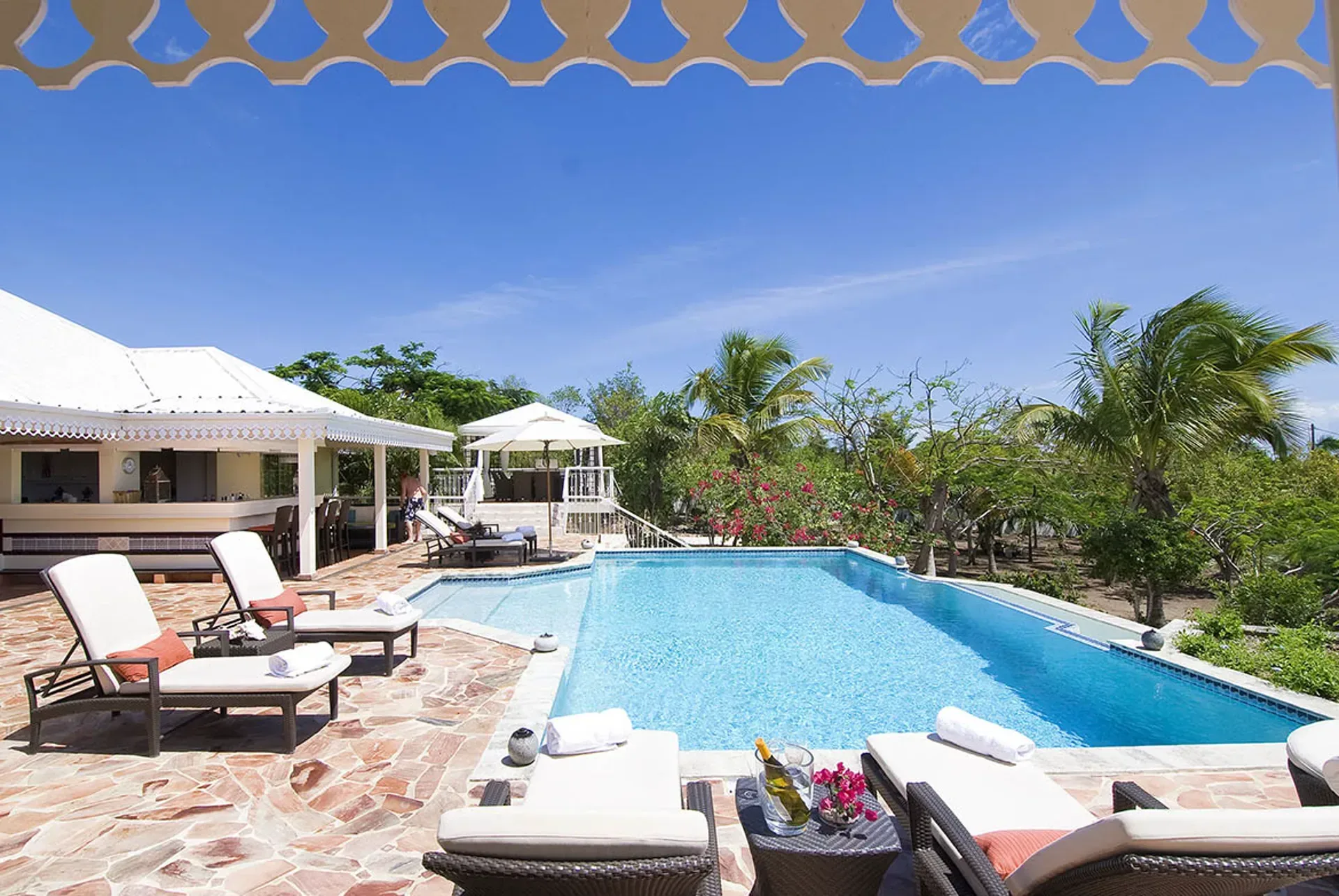Relax by your private pool where elegant terraces and tropical gardens create Caribbean serenity.