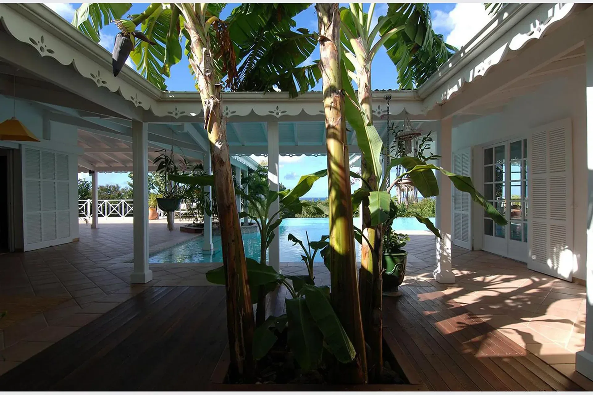 An open-concept living room flows naturally to outdoor spaces.