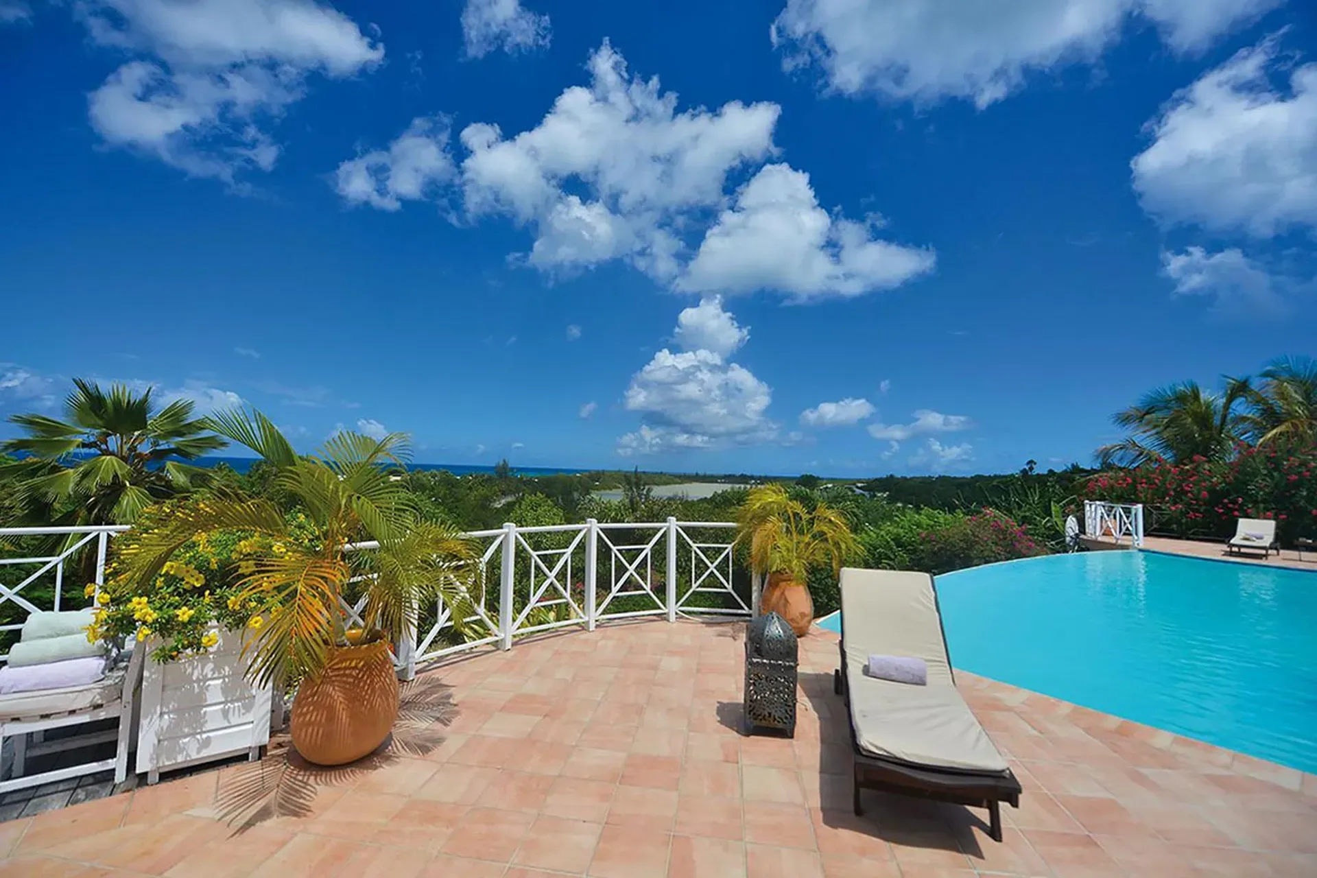 Your private pool terrace offers stunning views and Caribbean relaxation.