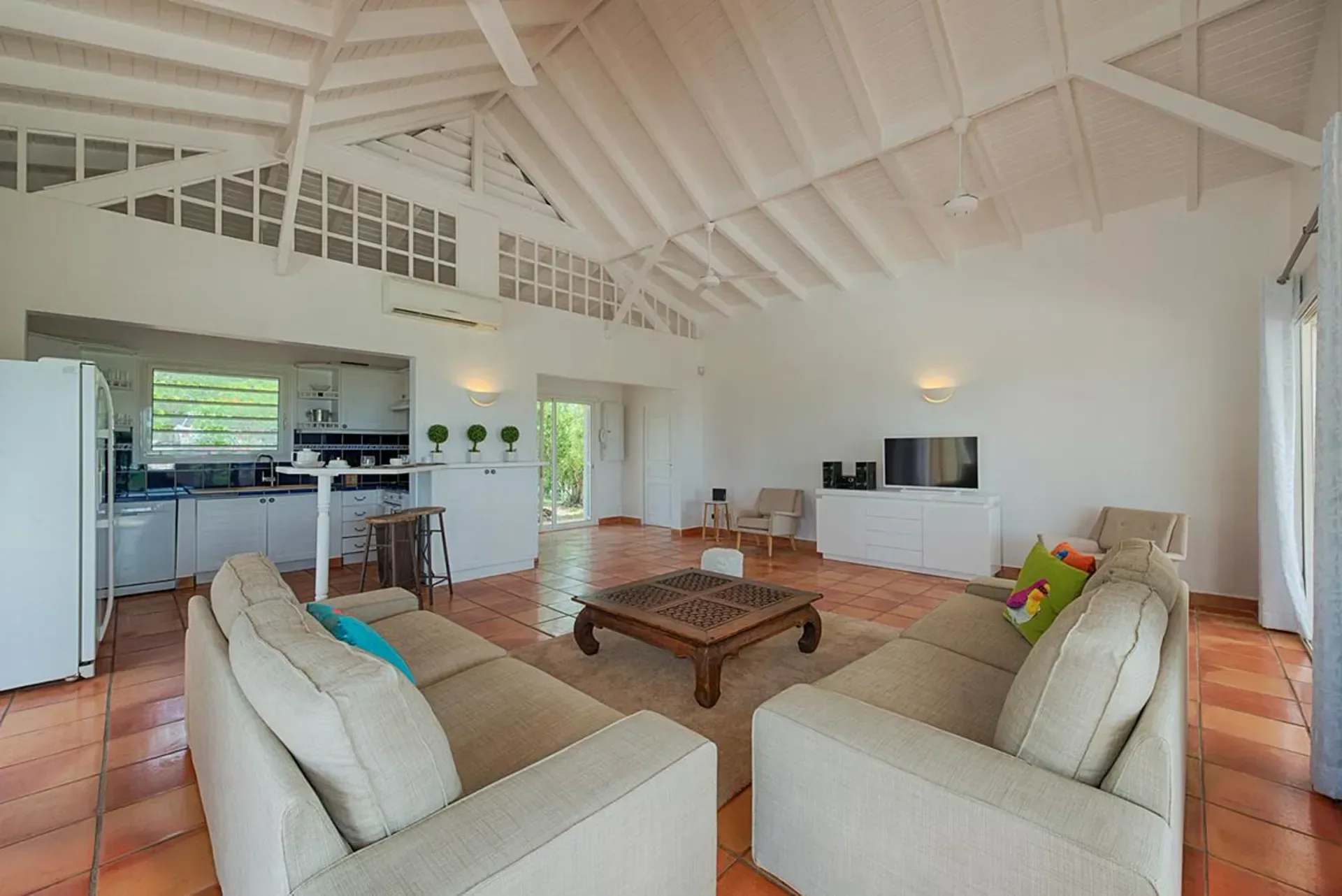 Relax in a sun-drenched open-plan living area.