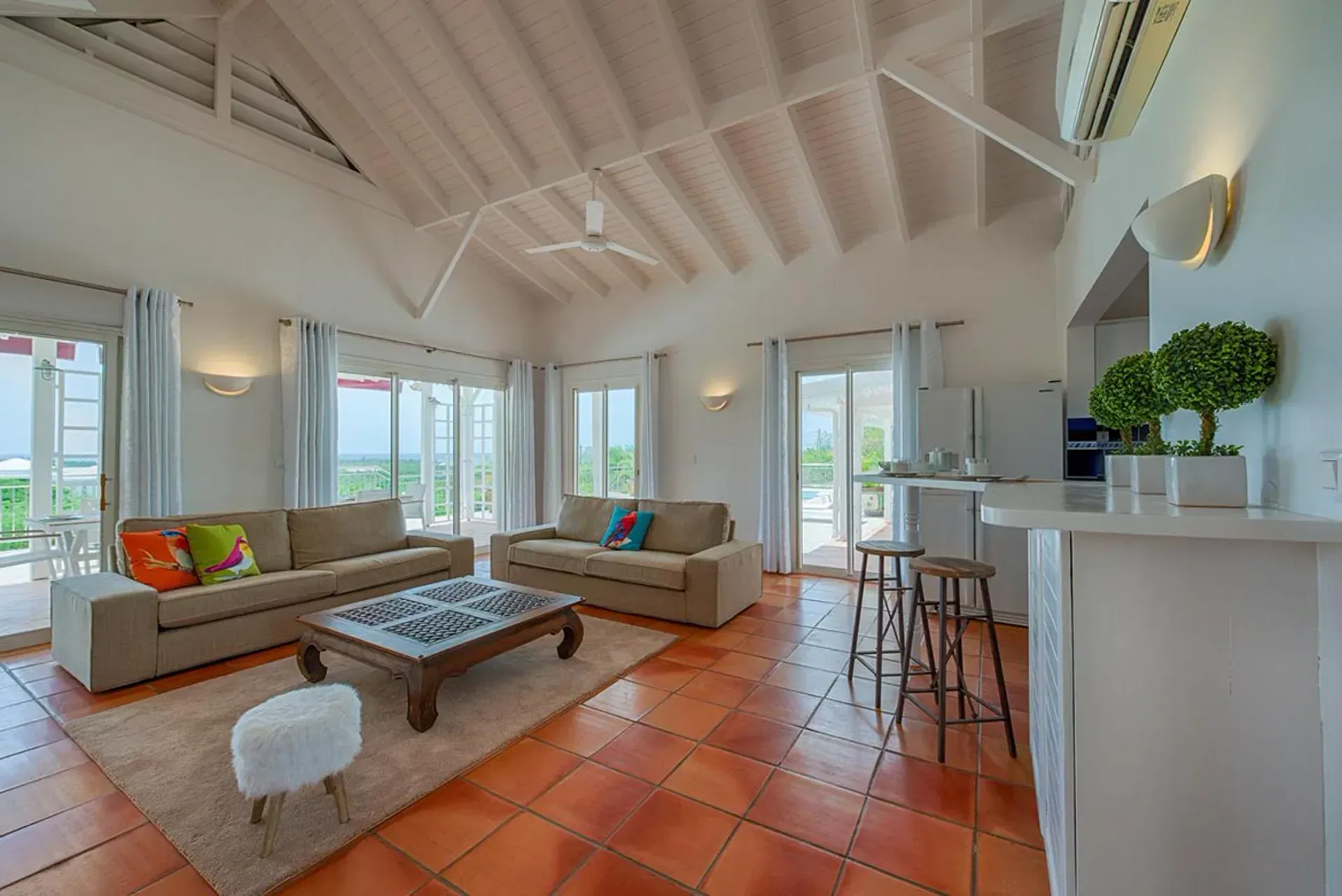 Unwind in a bright living area with direct terrace access.