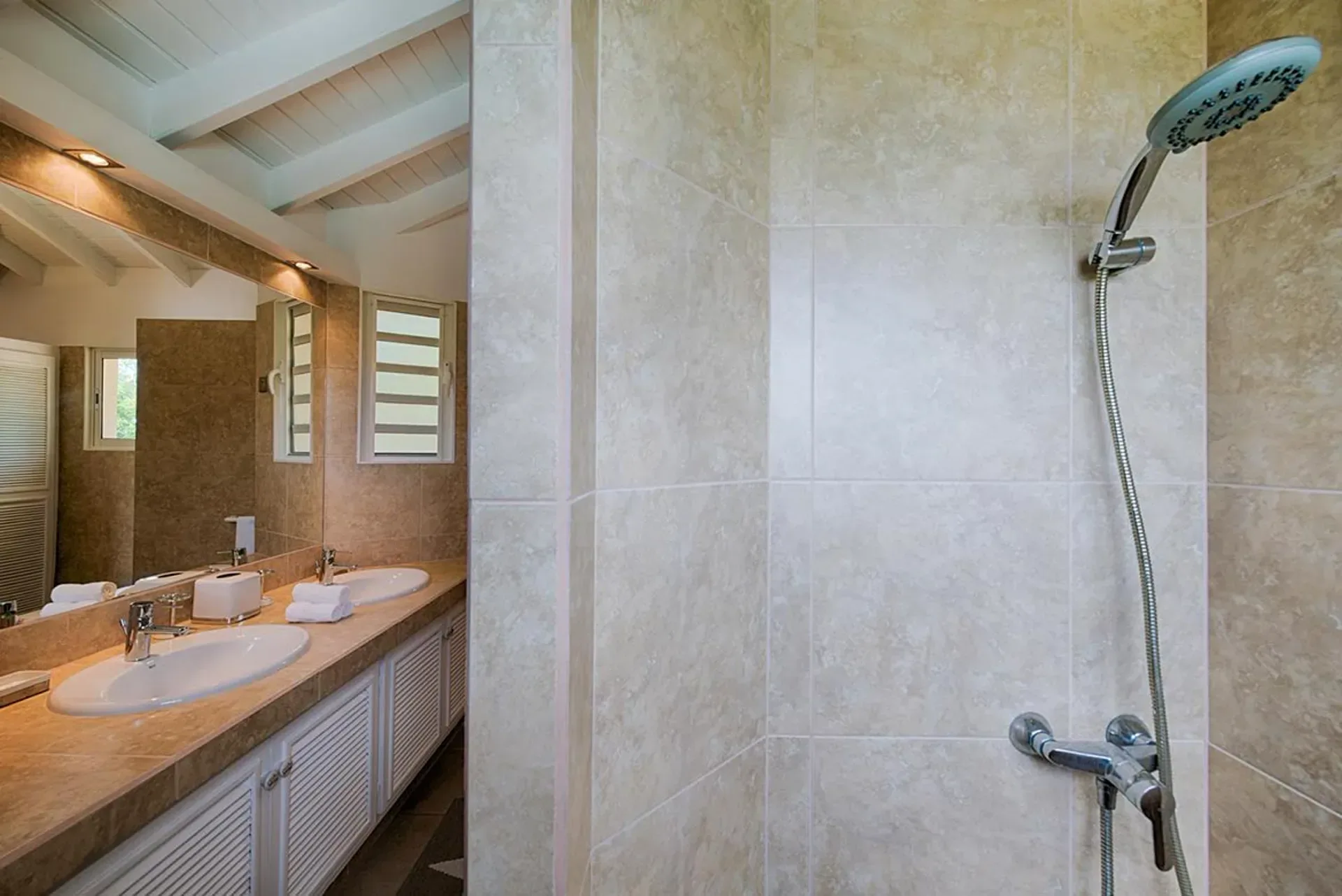 Refresh in a spacious bathroom with modern walk-in shower.