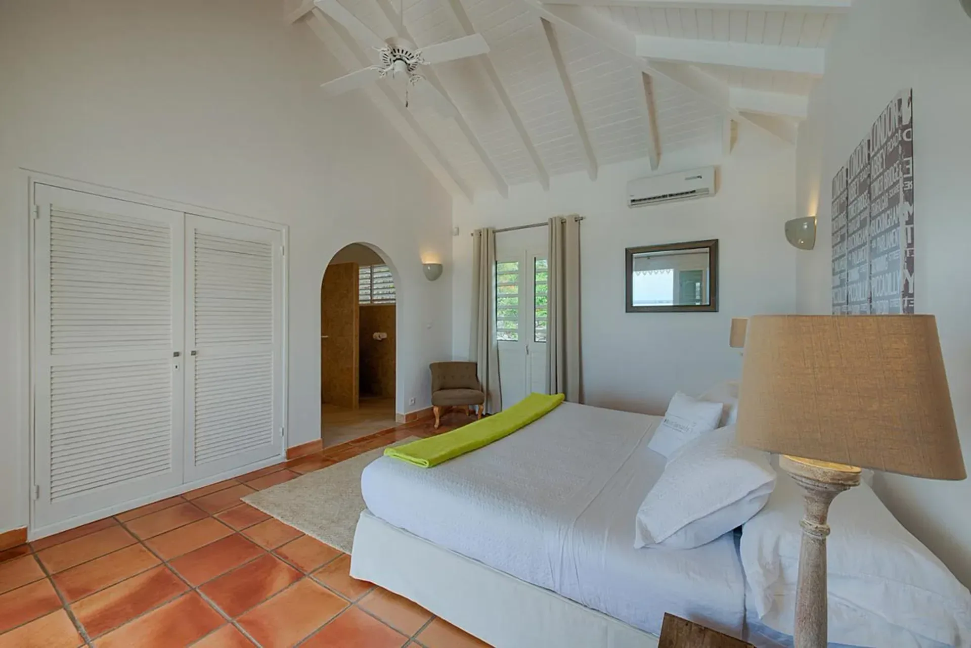 Sleep in spacious comfort with vaulted ceilings and plush king bed.