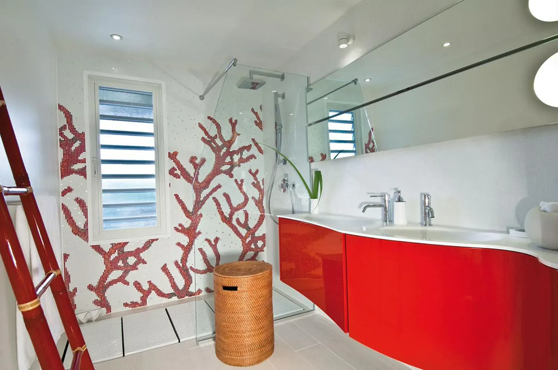 Refresh in vibrant modern style with a stunning red coral mosaic mural and spacious walk-in shower.
