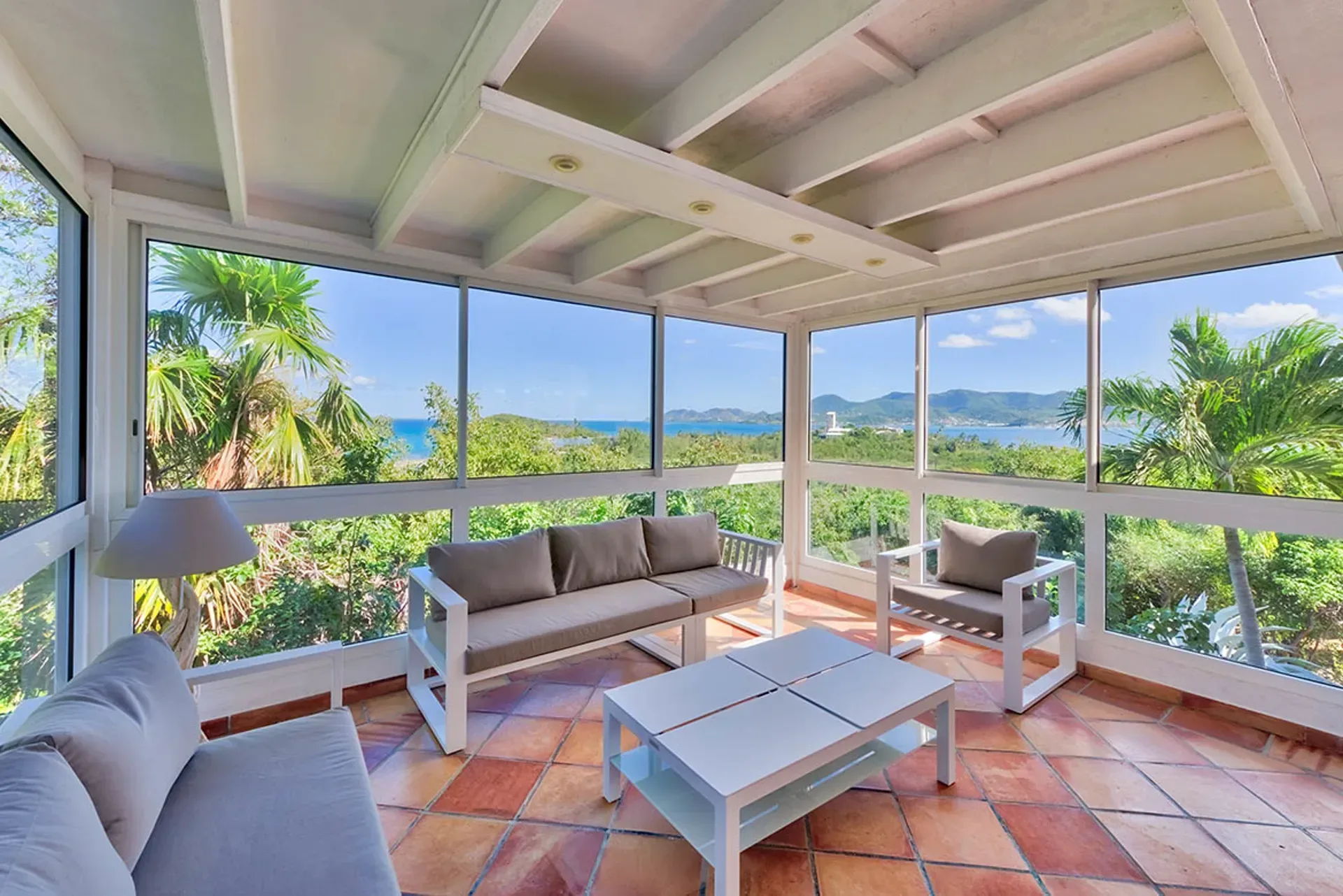Master bedroom with luxurious Caribbean elegance.