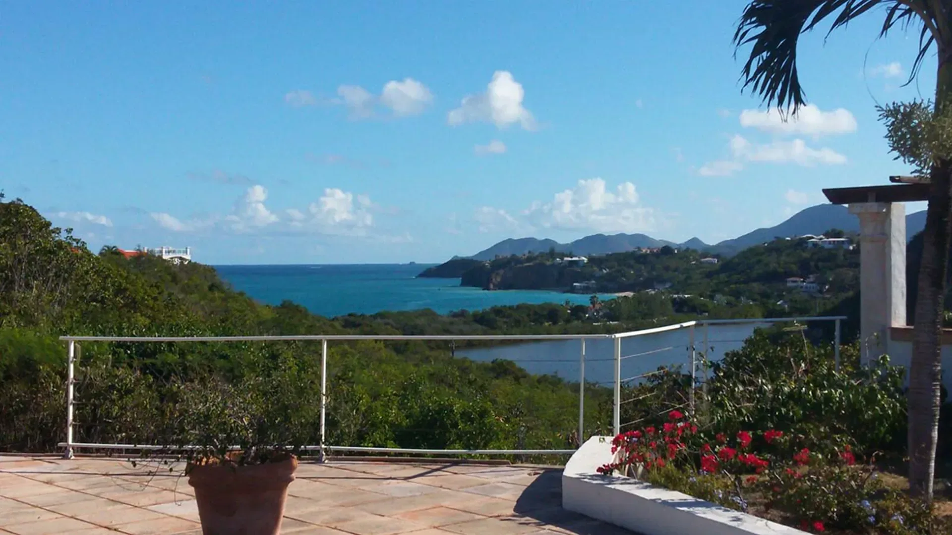 Take in sweeping views of turquoise Caribbean waters, coastal cliffs, and lush lagoons from your hillside terrace.
